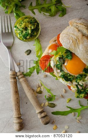Ciabatta With Fried Egg, Tomatoes And Pesto