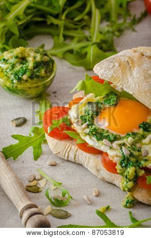 Ciabatta With Fried Egg, Tomatoes And Pesto