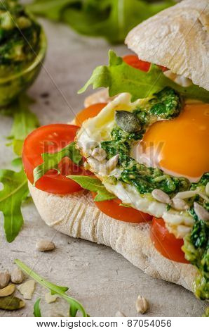 Ciabatta With Fried Egg, Tomatoes And Pesto