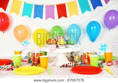 Prepared birthday table with sweets for children party