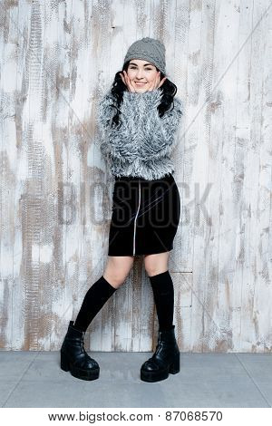 Cheerful woman in hat