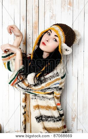 Cheerful funny woman in warm hat