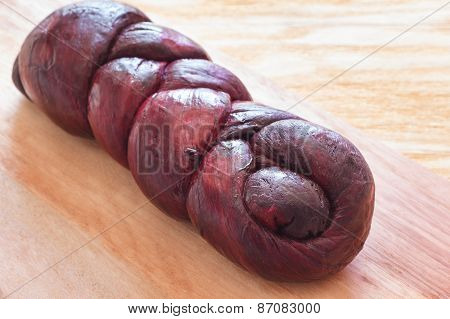 Closeup Of Treccia - Braided Mozzarella Cheese Marinated In Red Wine