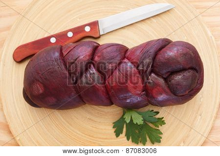 Treccia Braided Mozzarella  Marinated In Red Wine With Knife