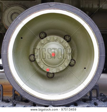 wheel tracks of the tank and painted in khaki color closeup