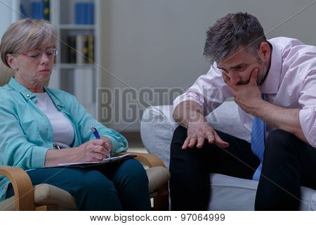 Therapist Analysing Problem Of Patient