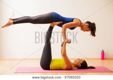 Acrobatic Yoga In A Gym