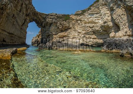 Unique And Scenic Arch In The Cliffs, Paxi, Greece