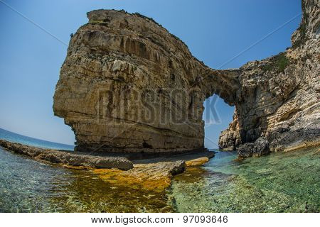 Unique And Scenic Arch In The Cliffs, Paxi, Greece