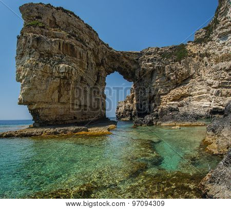 Unique And Scenic Arch In The Cliffs, Paxi, Greece
