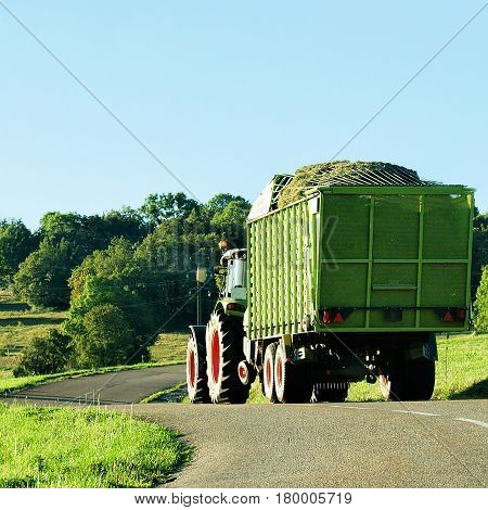 Tractor With Trailer Full Of Hay Of Bourgogne Franche Comte
