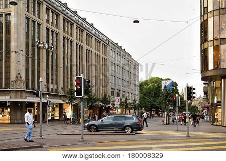Cars And Pedestrians On Bahnhofstrasse In Zurich City Center