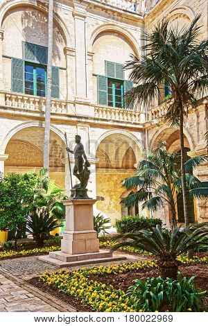 Neptune Statue In Courtyard Of Grandmaster Palace Valletta