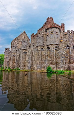 Gravensteen Towers And Leie River In Ghent In East Flanders