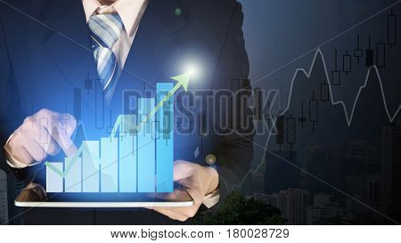 Double Exposure Businessman Hand Touching Growth Bar Chart On Financial Graph And Building Backgroun