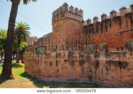 Ancient City Walls And Tower In Macarena District In Seville