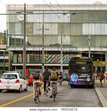 People Bicycle And Bus At Train Station On Bahnhofplatz Bern