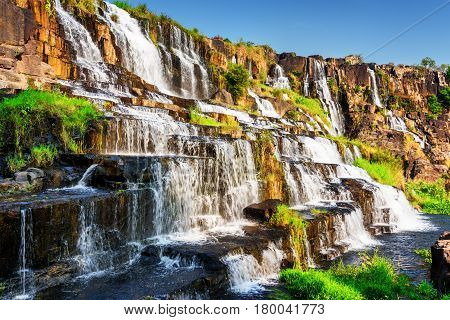 Scenic Natural Cascades Of Waterfall With Crystal Clear Water