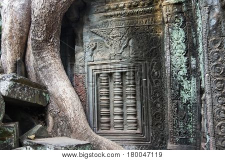 Detail of carvings in Angkor ThomUNESCO world heritage. Angkor Wat Cambodia.