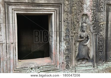Detail of carvings in Angkor ThomUNESCO world heritage. Angkor Wat Cambodia.