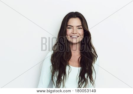 Smiling beautiful woman with long hair portrait