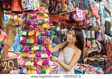 asian young woman traveling and shopping at Chatuchak weekend market, Bangkok, Thailand