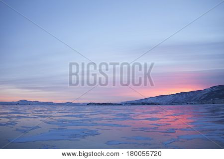 Lake Baikal, Winter. Cape Uyuga. Sunset Landscape.