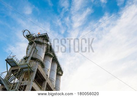 Silo storage for plastic resins, Storage silo on sky background.