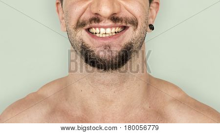 Adult man smiling studio portrait