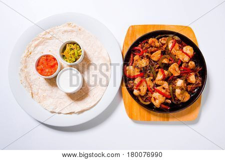 Stir Fry Chicken With Sweet Peppers And Green Beans In Wok Pan