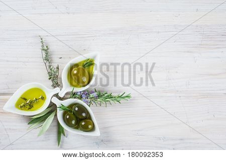 Extra Virgin Olive Oil And Green Olives