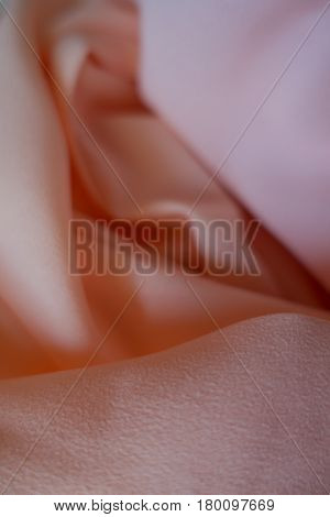 Chiffon fabric in pink and peach pastel colors (triangle)