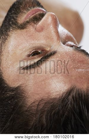 Close up on hot guy sweating wellnes