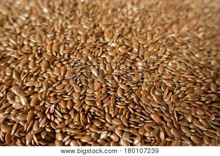 Lots of raw organic flax seeds (close-up)
