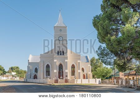 PHILIPPOLIS SOUTH AFRICA - MARCH 21 2017: A street scene with the Dutch Reformed Church in Philippolis the oldest town in the Free State Province