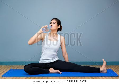 Asian young woman preparation yoga in the room and sport yogayoga in the roomsport yogayoga practiceyoga relax