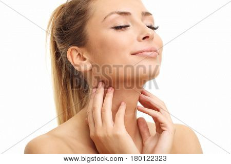 Woman face portrait isolated on white with healthy skin