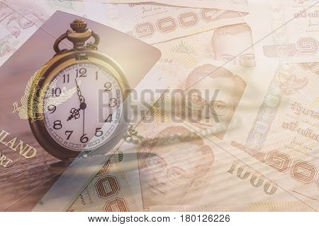 pocket watch over thai baht banknotes with double exposure effect time is money business and finance concept