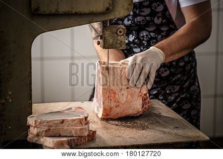 Worker Cuts Beef Meat