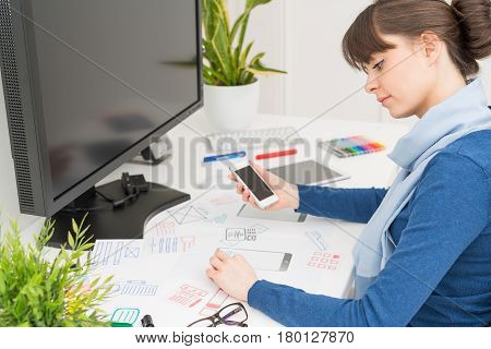 Designer woman drawing website ux app development. User experience concept.