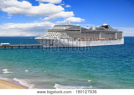 Luxury Cruise Ship at pier on summer day