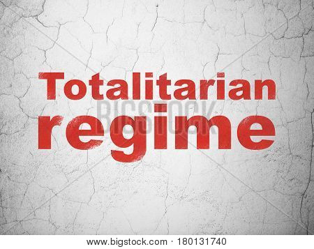 Politics concept: Red Totalitarian Regime on textured concrete wall background