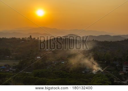 Mountain soft fog scenic sunset at Chaingrai Thailand. Mountain hill viewpoint scenic landmark .