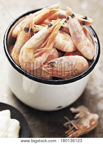 close up of rustic english pub grub pint of prawns
