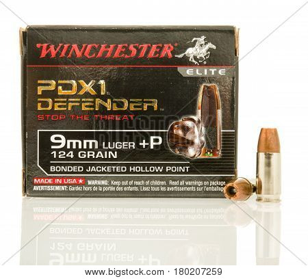 Winneconne WI - 5 April 2017: A box of Winchester PDX1 Defender 9mm hollow point bullets on an isolated background.