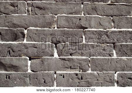 Rough textured wall in black and gray