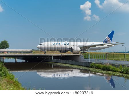 SCHIPHOL NETHERLANDS - JUNE 4 2016: United airplane taxiing to the runway on amsterdam schiphol airport