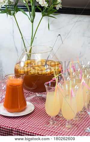 Fresh juice on a table in a restaurant. Healthy drinks. carrot fresh in a jar.