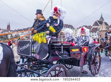 BASEL SWITZERLAND - MARCH 08 : Participants in the Basel Carnival in Basel Switzerland on March 08 2017. The Basel carnival has been listed as one of the top local festivities in Europe