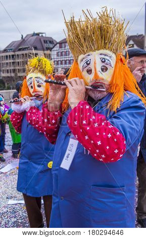 BASEL SWITZERLAND - MARCH 08 : Participants in the Basel Carnival in Basel Switzerland on March 08 2017. The Basel carnival has been listed as one of the top local festivities in Europe